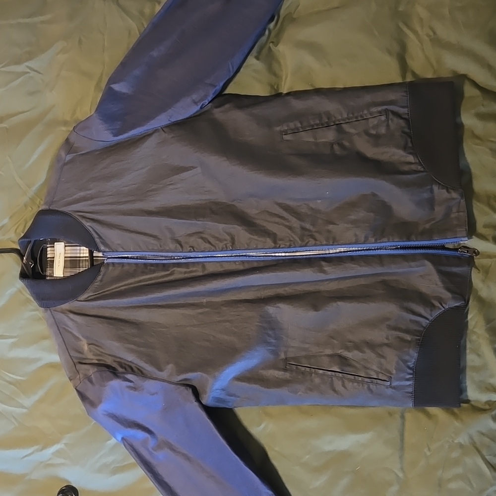 Black with blue accents bomber jacket by Five Four